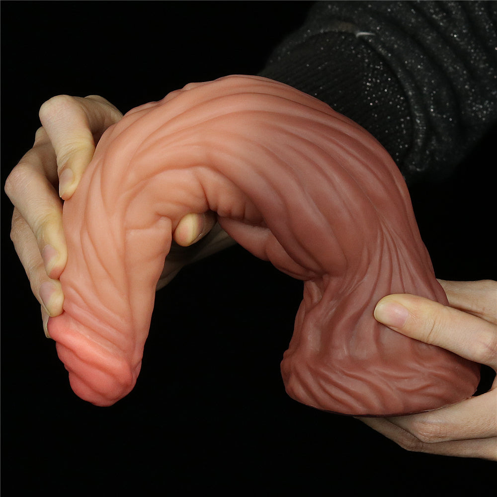 9.5IN DUAL LAYERED PLATINUM SILICONE COCK